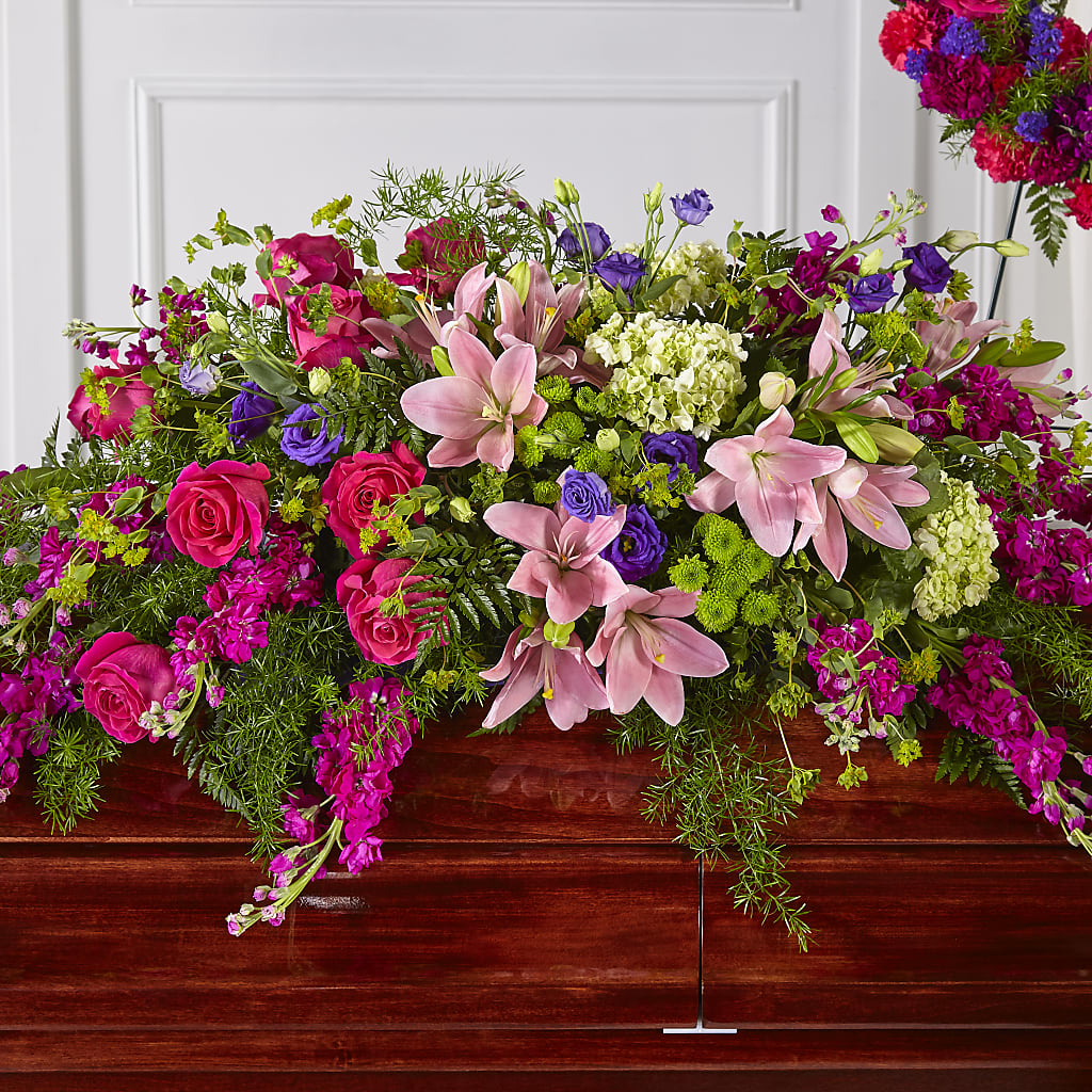 Radiant Tribute Casket Spray – Meramec Florist, Steelville MO