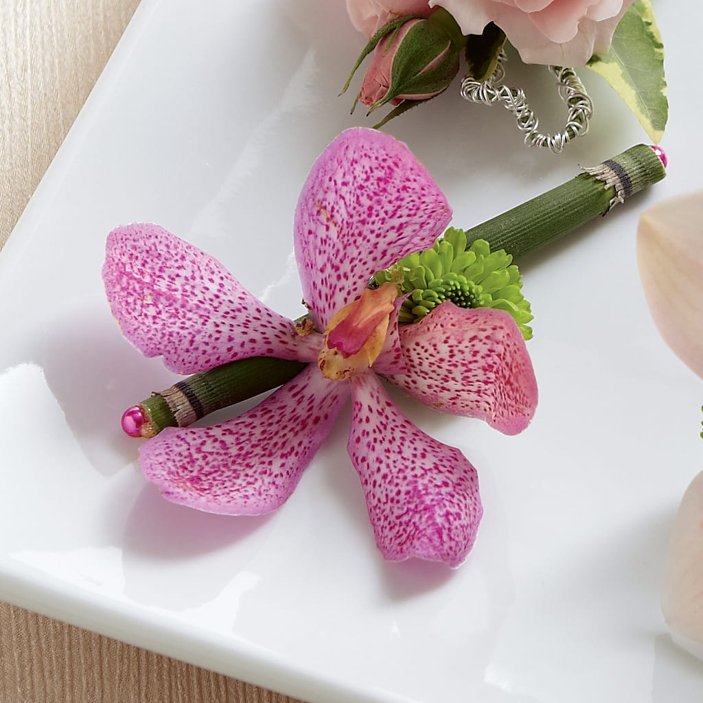 Pink Mokara Boutonniere – Meramec Florist, Steelville MO